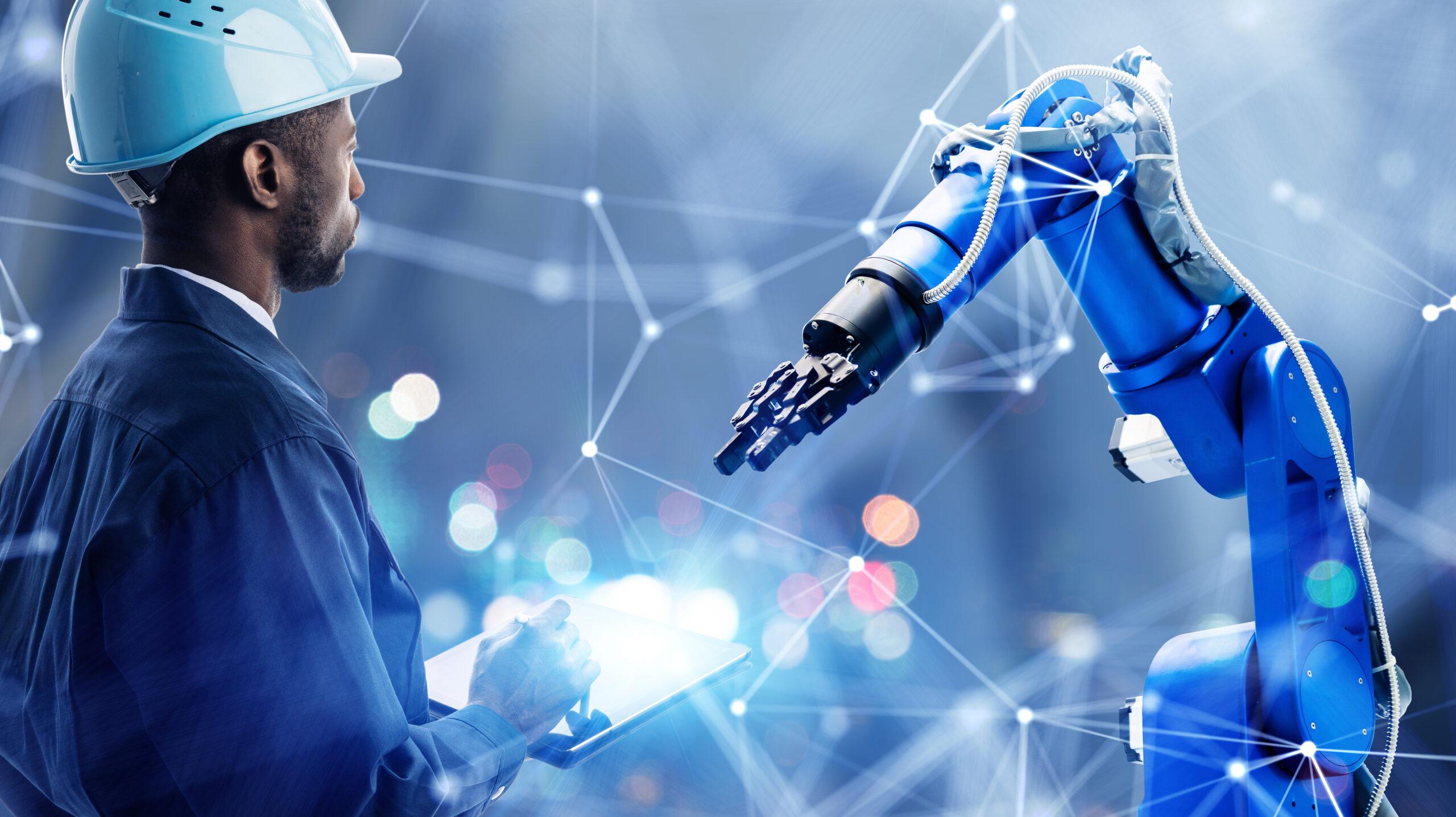 Manufacturing automation with robotic arm in blue lighting